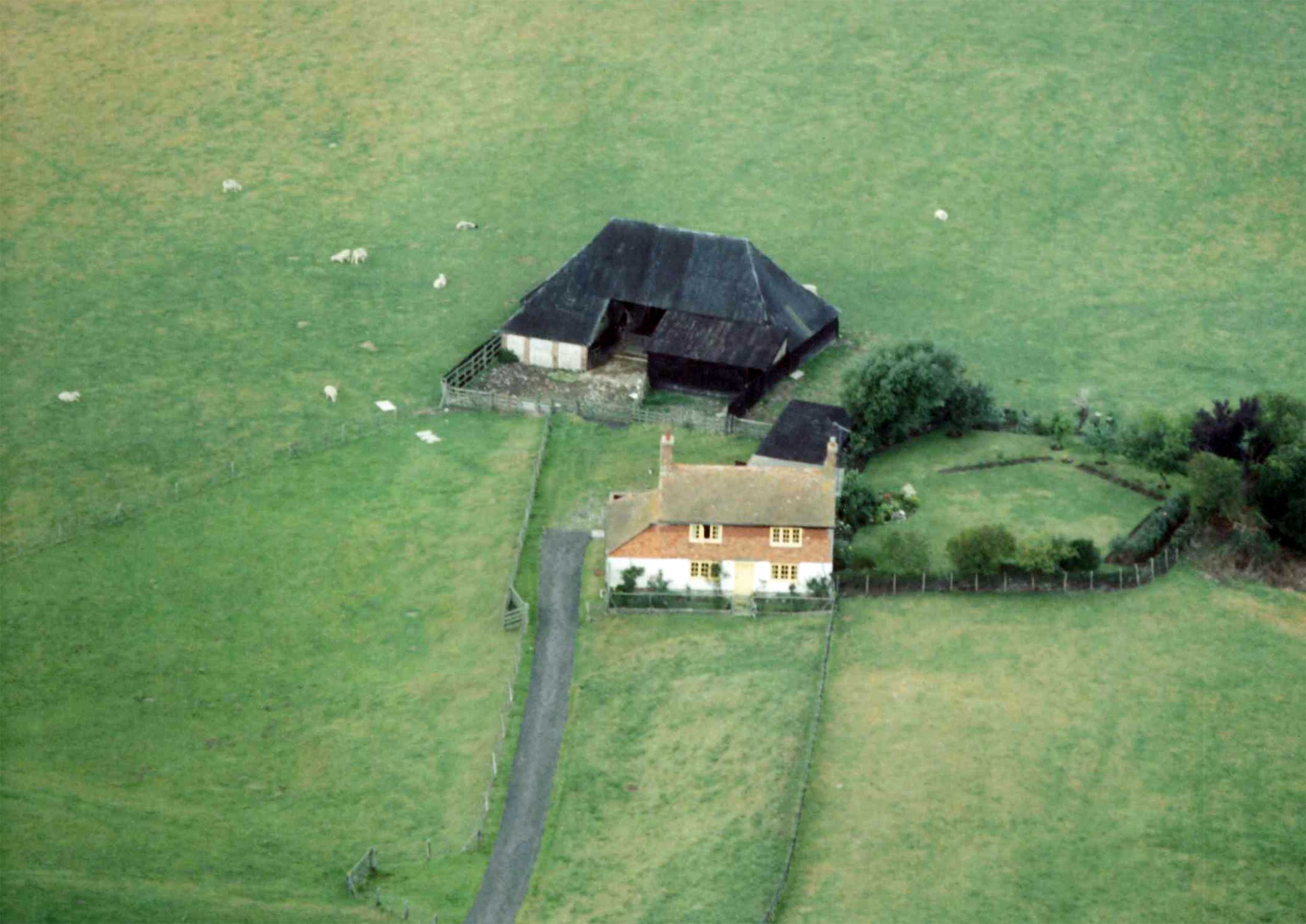 The old Coldharbour Cottage and barn